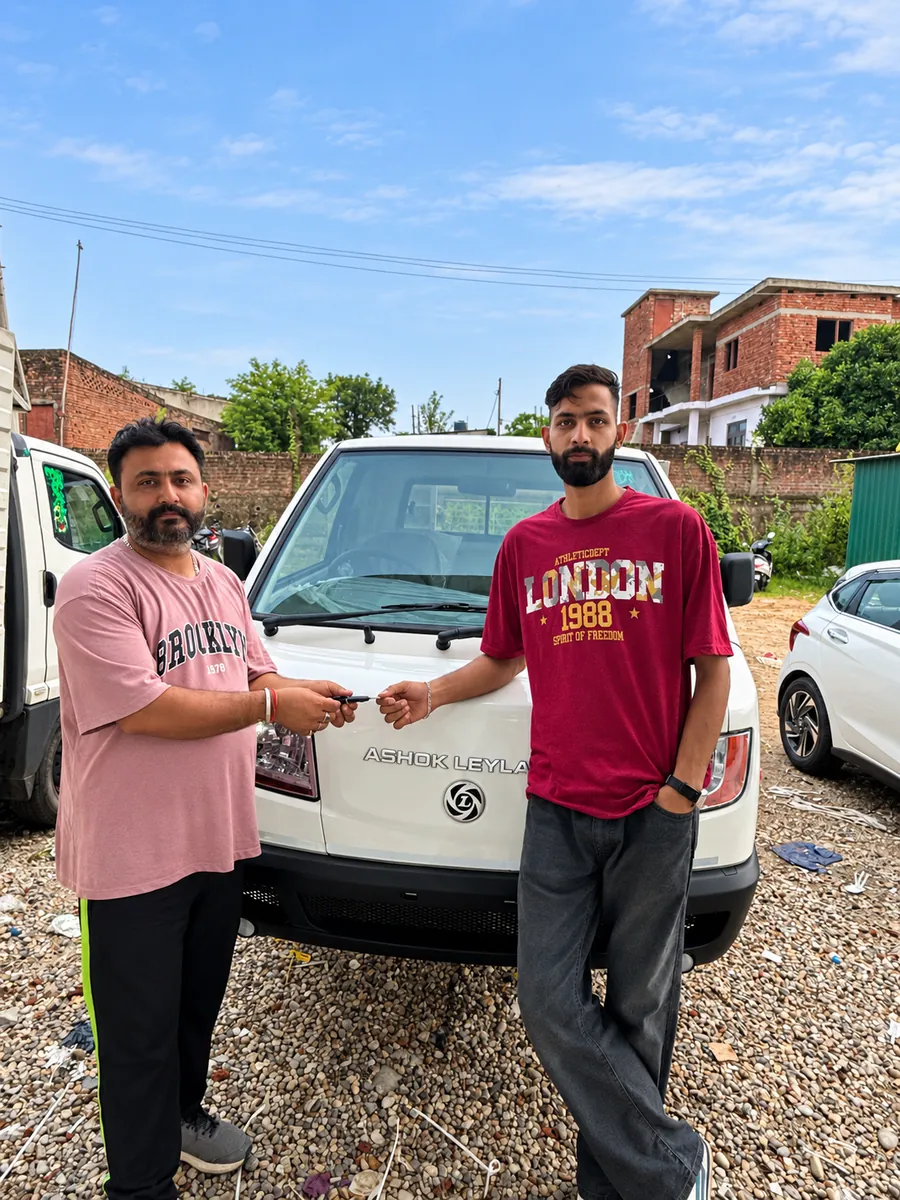 Customer taking delivery of a new Ashok Leyland light commercial vehicle