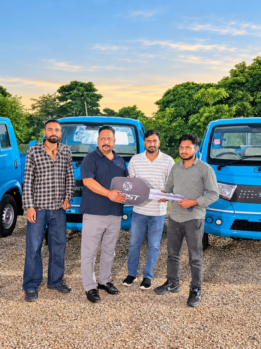 Customers receiving the keys to newly delivered light commercial vehicles at YA Mobility